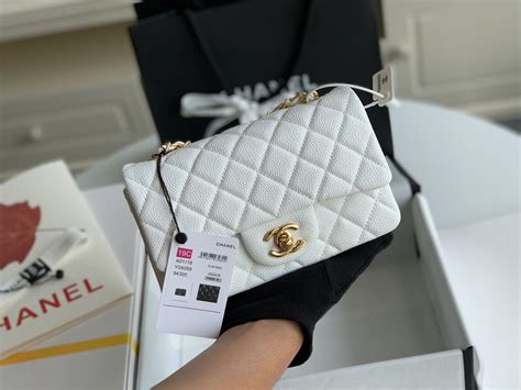 chanel crossbody round white|White Chanel tote bag.